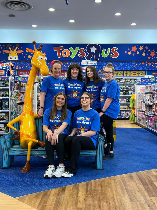 Image of ToysRus staff in store.